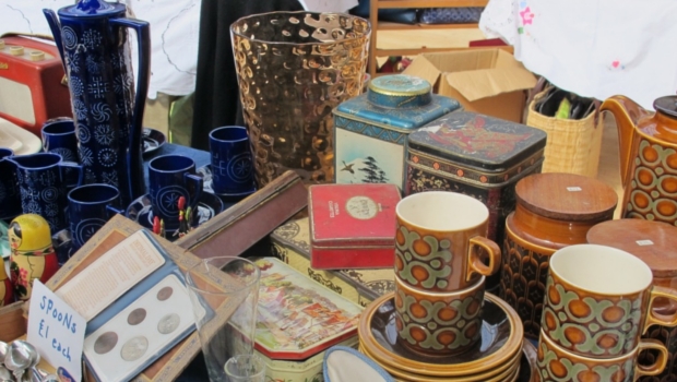 Various ornaments line the tables of the Edinburgh Flea Market, including cups, vases and jugs.