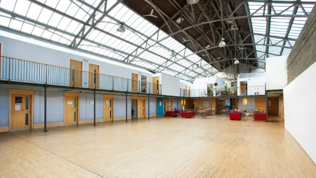 Wide-angle shot of the Drill Hall art studios, including studio space on the ground floor, first floor, exhibition hall and a cafe.