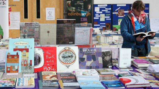 A display of books is browsed through at the Edinburgh Radical Book Fair event.