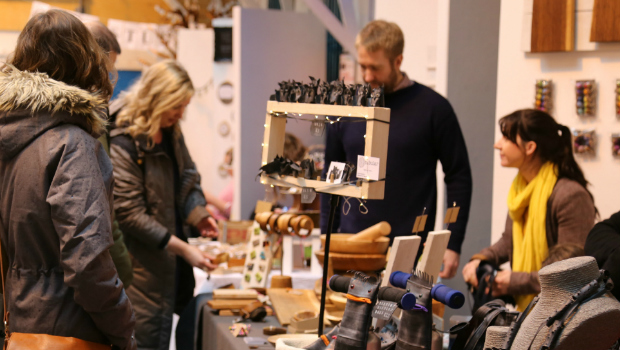Artists show off their jewellery and accessories at a Christmas Arts Market