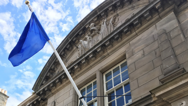 Blue flag flying outside the Drill Hall on Dalmeny Street, Edinburgh.