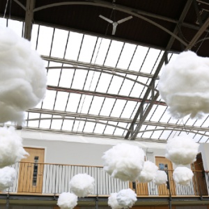 Cotton clouds floating below the Drill Hall roof