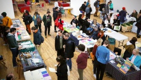 Crowds browse magazines at a Zine Fair